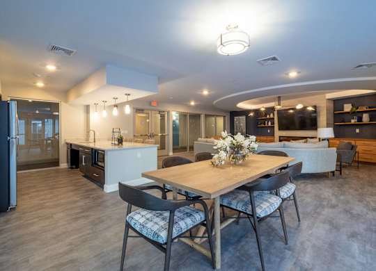 A large dining area with a communal table, ideal for hosting events or gatherings.