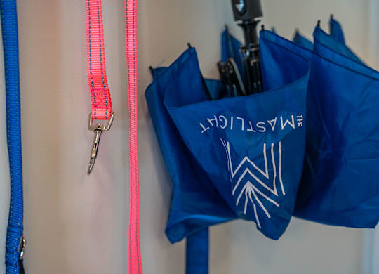 Umbrella hanging at front door of an apartment at the Mastlight.