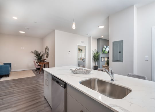 Millside kitchen granite countertops stainless appliances oven range microwave bright finishes