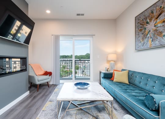 Millside living room model open floor plan balcony and wood finish flooring wide plank