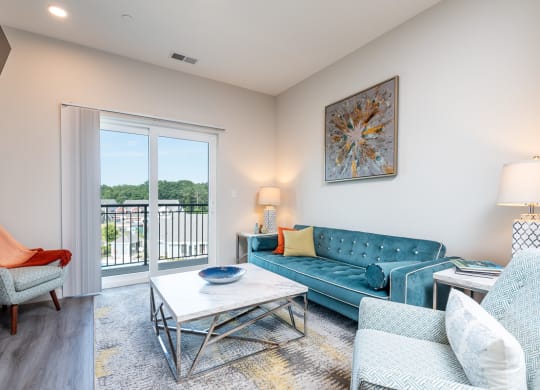 Millside living room model open floor plan balcony and wood finish flooring wide plank