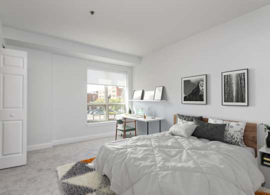 Bedroom view at Munroe Place in Quincy, MA- virtually staged
