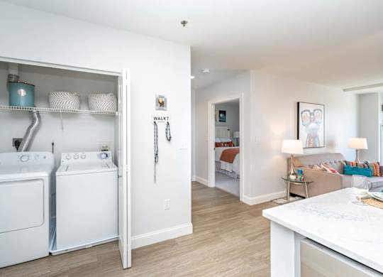 Full sized laundry at Munroe Place one bedroom apartment in Quincy