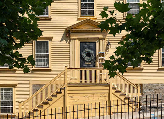 A house with a front porch and a wreath on the door.