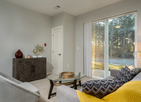 Redbrook two bedroom model apartment with large living space and patio