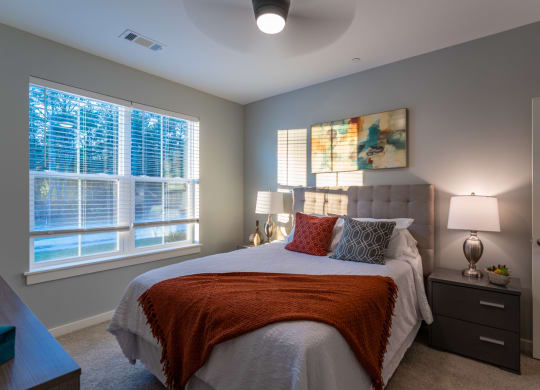 Redbrook model apartment two bedroom with large windo and ceiling fan