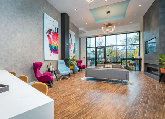 union 346 community space with paitings and lounge seating at Union 346, Somerville, MA 02143