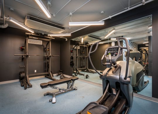 fitness center with bench and weights at Union 346, Somerville, MA 02143