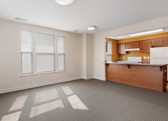 a kitchen and dining room in a 555 waverly unit
