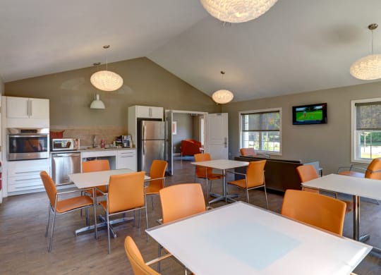 Community clubroom with kitchen at Mansfield Meadows Apartments in Mansfield, MA