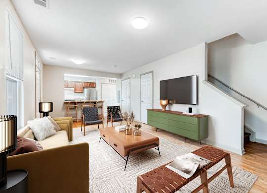 Living And Dining Area With Couch And Ottoman at Niagara Square, Buffalo, 14201