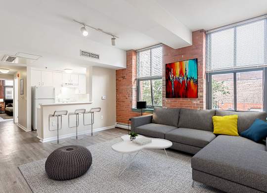 a living room with a couch and a table at Ninth Square Apartments, Connecticut, 06510
