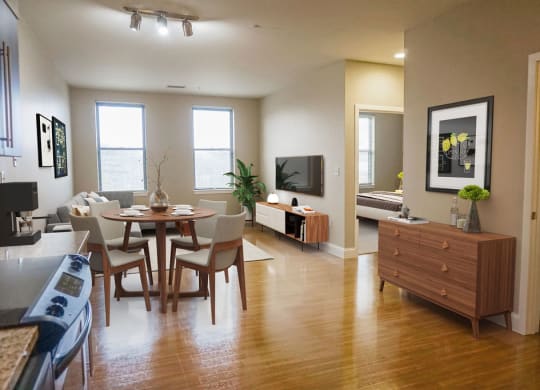 Bright And Open Dining Area With Hardwood Floors.