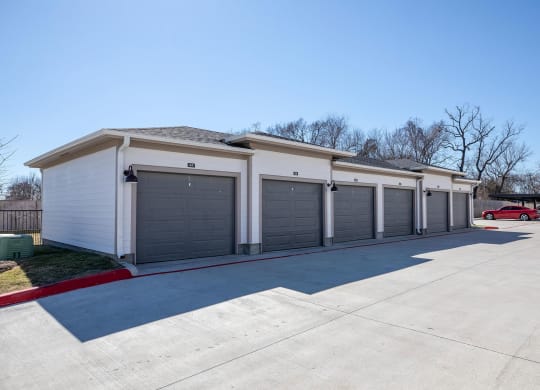 a row of garages at 55 Fifty at Northwest Crossing, Houston Texas