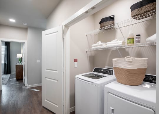 our apartments offer a laundry room with washer and dryer at 55 Fifty at Northwest Crossing, Houston, TX
