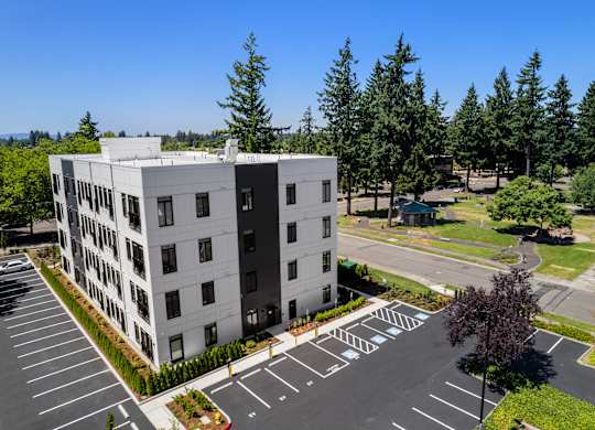 A large white building at The Hub Apartments, Washington