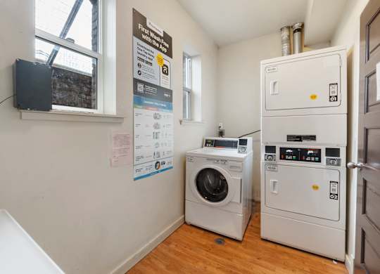 A laundry room with a washer and dryer.