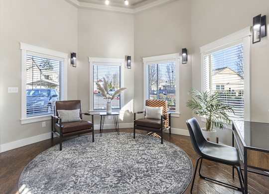 Office space with seating and round rug