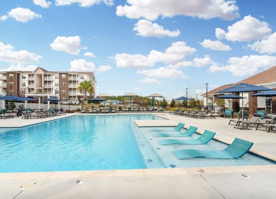 the swimming pool at the resort at governors crossing at The Met Apartment Homes, Hattiesburg, Mississippi