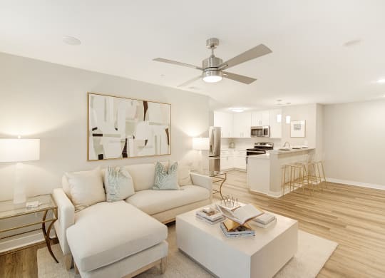 a living room with a couch and a coffee table at The Azul Apartment Homes in Oxford, MS