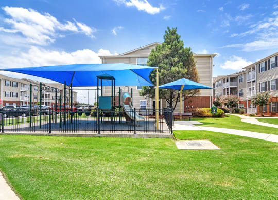 the preserve in play area with playground equipment at Summit of Shreveport Apartments, Shreveport, Louisiana