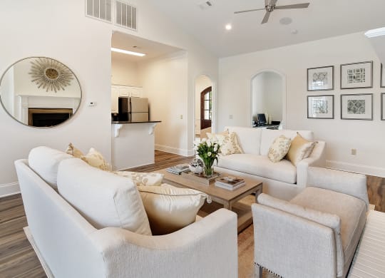 a living room with couches and chairs and a coffee table at Summit of Shreveport Apartments, Shreveport, 71105