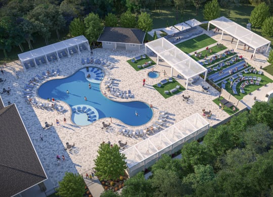 an aerial view of a resort pool with a poolside party area and a resort at The Azul Apartment Homes in Mississippi 38655