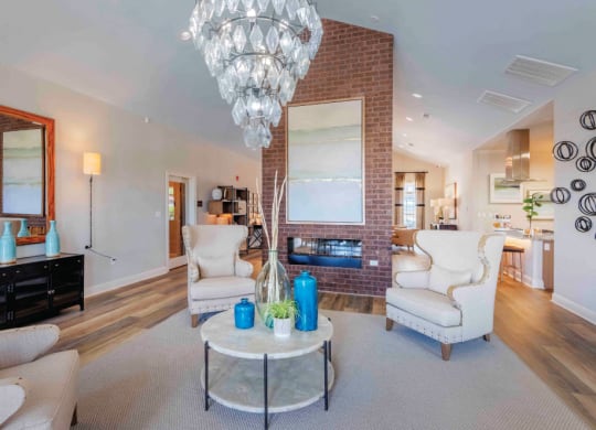 Living Room with a Fireplace at The Met Apartment Homes, Hattiesburg, 35402
