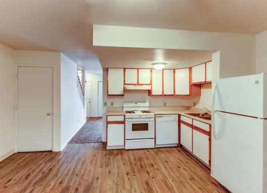 Large kitchen with fridge and dishwasher at Arbor Pointe Townhomes, Battle Creek, Michigan