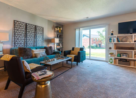 Living Room With Balcony at Hamilton Square Apartments, Westfield, Indiana