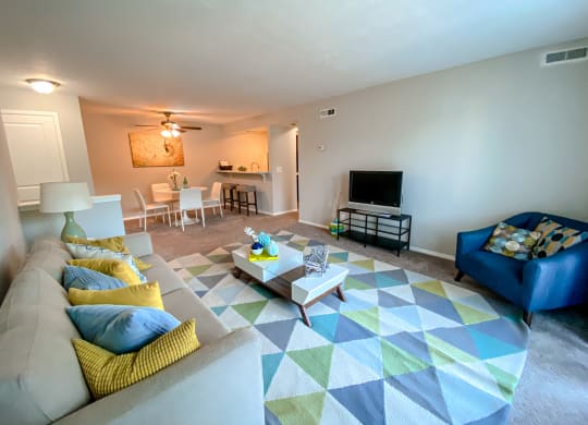 Spacious living room open to the dining room at Camelot East Apartments, Fairfield, 45014