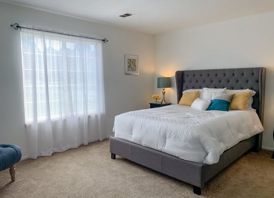 Spacious bedroom with large closet at The Lodge Apartments in Indianapolis, IN