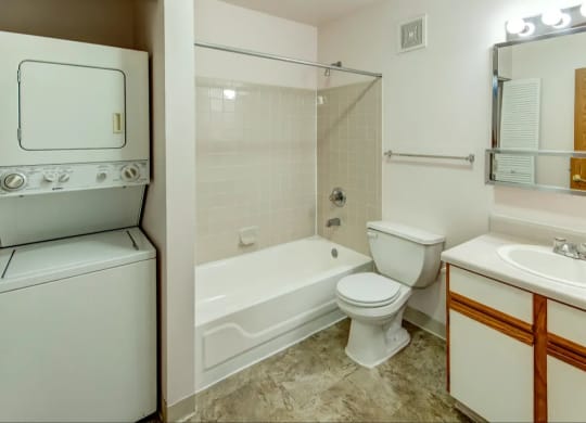 Spacious bathroom with laundry unit at Walnut Creek Apartments, Kokomo, 46902
