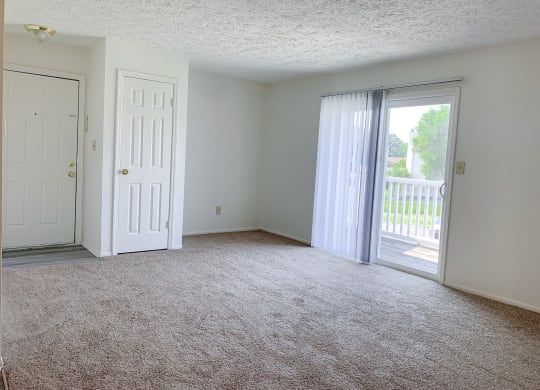 Spacious living room at Waterstone Place Apartments in Indianapolis, IN 46229