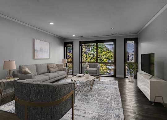 Living room with balcony access and hardwood flooring at Nineteen North Apartments, Buffalo, 14202