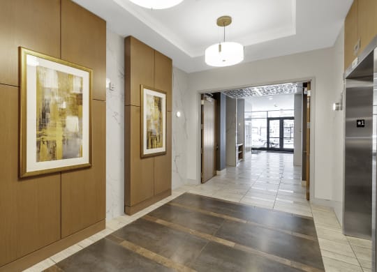 a hallway with wood paneling and a painting on the wall at Nineteen North, New York