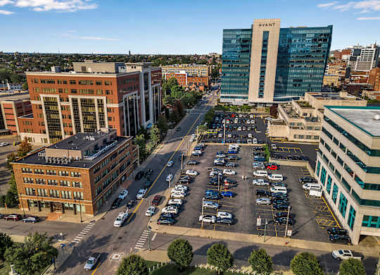 a view of a parking lot in a city with tall buildings at 100 South Apartments, New York