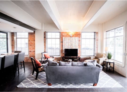 Living Room With Expansive Window and plenty of Natural lights at The Lofts at Elk Terminal, Buffalo, NY