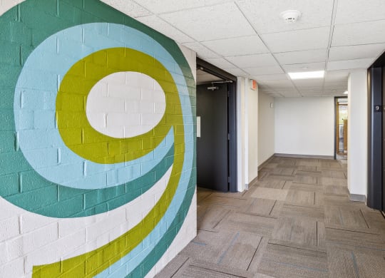 hallway with mural at Walnut Towers at Frick Park, Pittsburgh, 15217