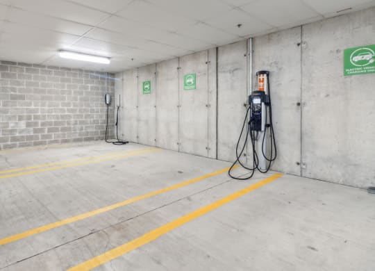 a gas station in a parking garage with a gas pump at Bakery Living, Pittsburgh, PA