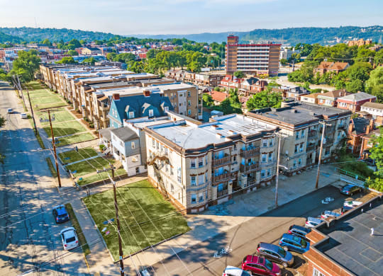 a view of the city from the top of a building at University Commons Apartments, Oakland, Pittsburgh