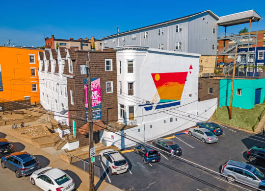 a mural on the side of a building at University Commons Apartments, Oakland, Pittsburgh