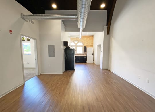 Hardwood Flooring in Kitchen Space at University Commons, Oakland 15213 McKee Place Apartments