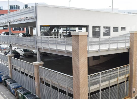 a bridge over a parking lot at Walnut on Highland, Pittsburgh, PA