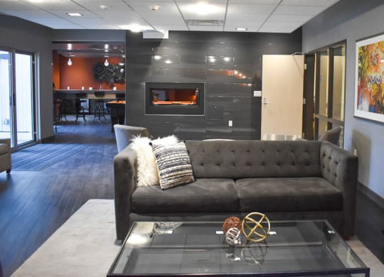 a living room with a couch and a coffee table Hot Metal Flats apartments, Southside Pittsburgh, PA