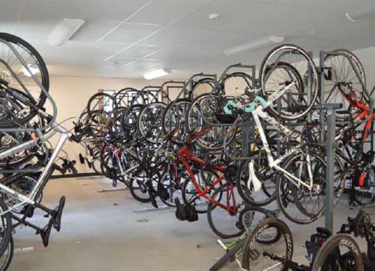 a room filled with lots of bikes sitting next to each other