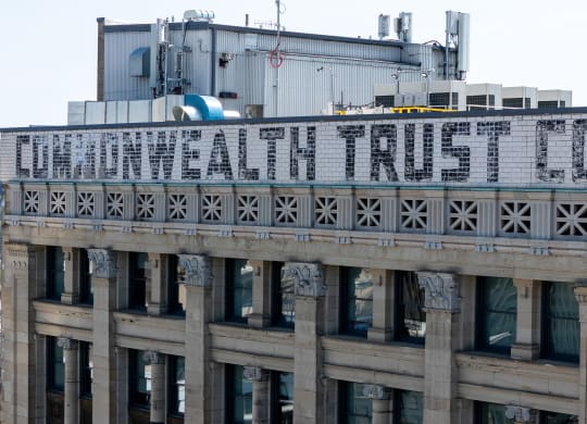 a sign on the top of a building that reads commonwealth trust co at The Commonwealth Building, Pittsburgh, 15222