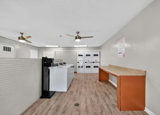 Laundry Room With Celling Fan at Fair Oaks Apartments, Little Rock, 72204