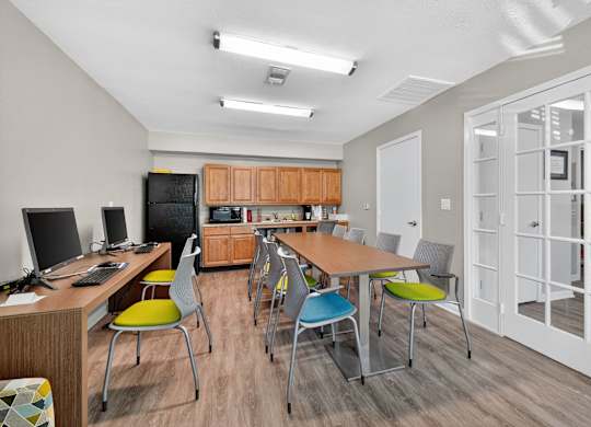 A Room With a Desk and Chairs at Fair Oaks Apartments, Arkansas, 72204