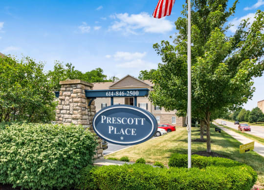the preserve place sign flag in front of the building